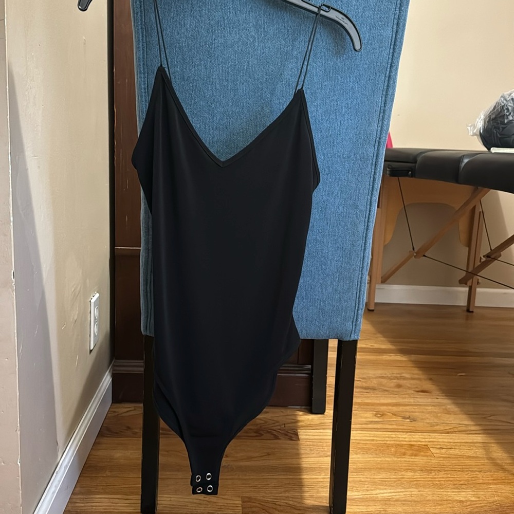 Black V-neck bodysuit. Worn once!